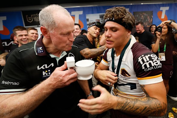 Maguire and Reece Walsh celebrate grand final victory last year.