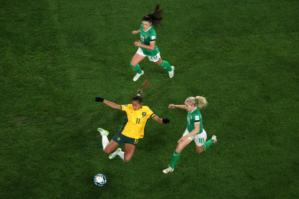 Mary Fowler competes with Ireland’s Denise O’Sullivan in Australia’s World Cup opener at Stadium Australia on Thursday night.