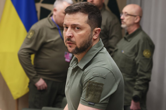 Ukraine’s President Volodymyr Zelensky waits for a meeting at NATO.