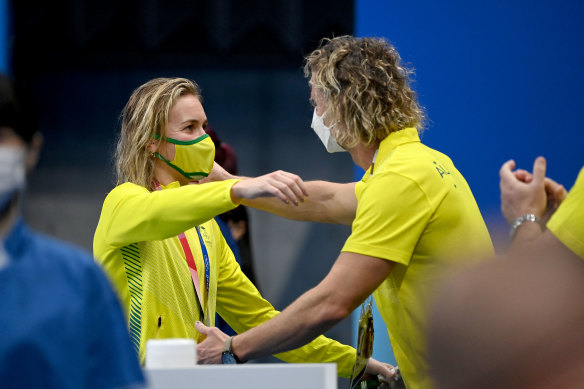 Ariarne Titmus and Dean Boxall embrace after the Australian’s memorable victory in the 400m freestyle final.