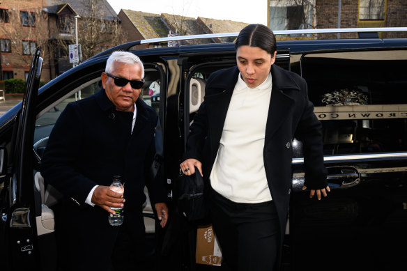 Sam Kerr arrives at court with her father, Roger Kerr.