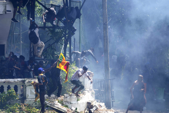 Protesters storm Sri Lankan Prime Minister Ranil Wickremesinghe’s office on Wednesday to demand he resign after President Gotabaya Rajapaksa fled the country.