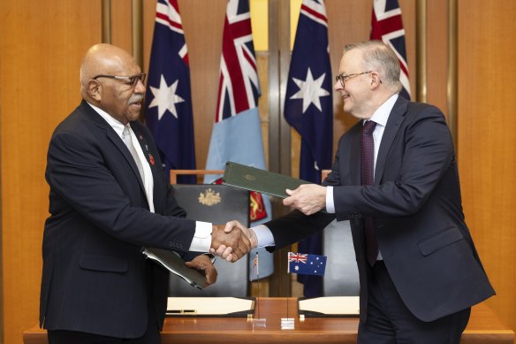 Prime Minister of Fiji, Sitiveni Rabuka and Prime Minister Anthony Albanese during a signing ceremony of the bilateral partnership arrangement, at Parliament House.