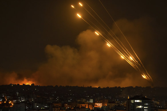 Rockets are fired toward Israel from the Gaza Strip, on Sunday October 8.