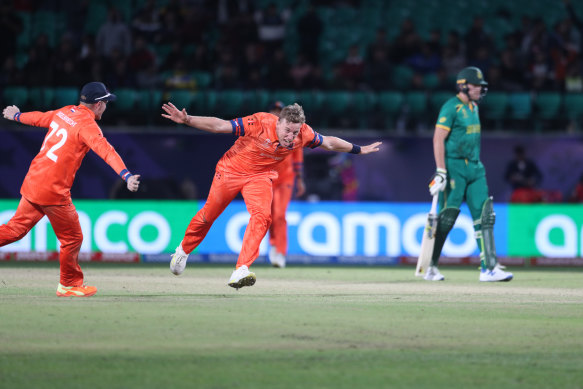 Logan van Beek celebrates the wicket of David Miller.