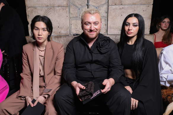 Suga, Sam Smith and Charli XCX at Paris Fashion Week. 