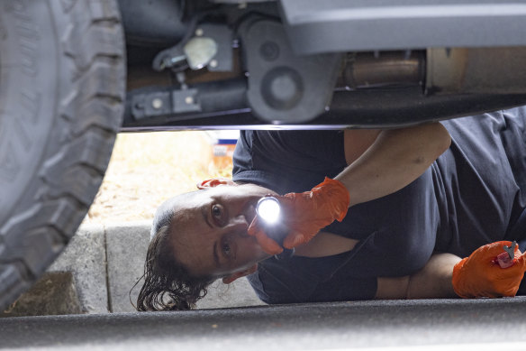 A federal police officer during the raid on the home of Mick Gatto’s accountant Charles Pellegrino.