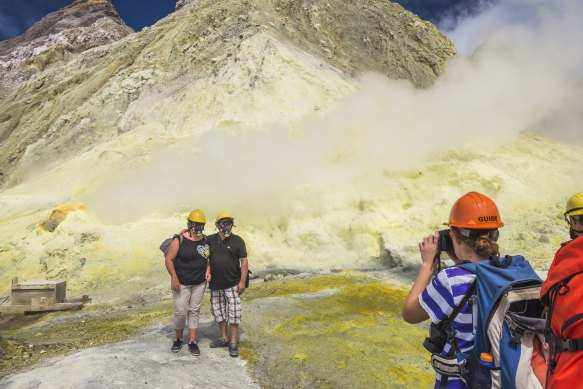 Tourists on a sightseeing tour of White Island Volcano, an active volcano in the Bay of Plenty, North Island, New Zealand that killed 22 people, including 14 Australians, when it erupted in 2019.
