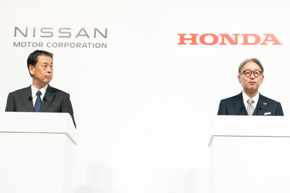 Miles apart: When Honda CEO Officer Toshihiro Mibe (right) was asked at a joint press conference with Nissan CEO Makoto Uchida (left) what was attractive about teaming up, he struggled to answer.