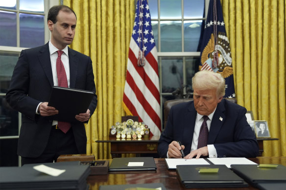 US President Donald Trump signs a slew of executive orders on the first day of his presidency.