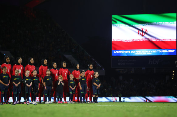 Iran line up for the national anthem before Thursday’s 2-0 Olympic qualifying loss to Australia.