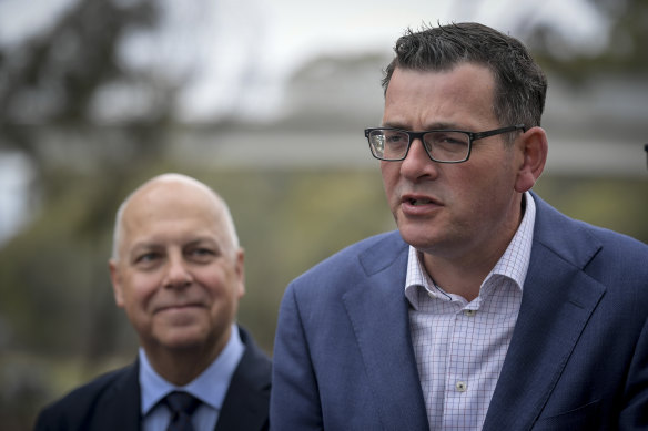 Treasurer Tim Pallas (left) and Premier Daniel Andrews are considering whether to implement an Airbnb tax in Victoria.