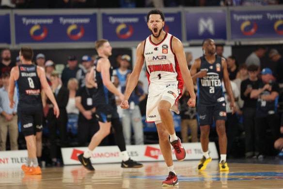 Illawarra Hawk Tyler Harvey celebrates after scoring in game four of the NBL Grand Final Series.