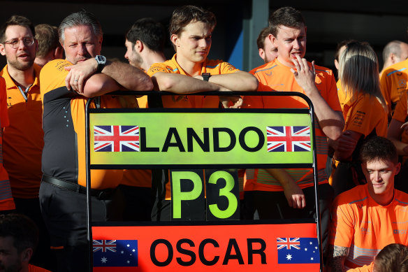 McLaren chief executive Zak Brown with Oscar Piastri in pit lane after the team decided to prioritise Lando Norris in the Australian Grand Prix.