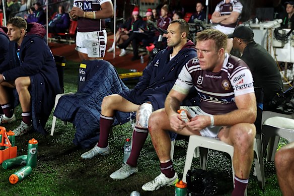 Luke Brooks watches the second half from the sideline on Saturday night.