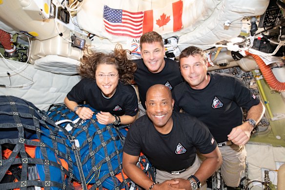 Clockwise from left, astronauts Christina Koch, Jeremy Hansen, Commander Reid Wiseman and pilot Victor Glover (center front).