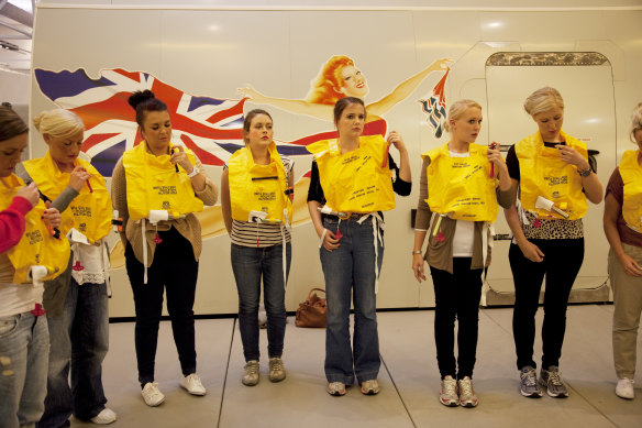 Flight attendants for Virgin Atlantic undergoing safety training.