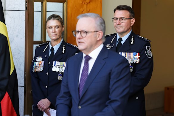 Prime Minister Anthony Albanese pictured on Monday with Krissy Barrett and Reece Kershaw. 