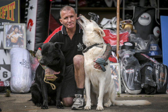 Former prison officer Paul O’Sullivan with his German Shepherds Gypsy (left) and Sultan (right).