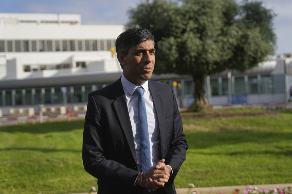 British Prime Minister Rishi Sunak speaks to the media as he arrives at Ben Gurion airport, near Tel Aviv, Israel.