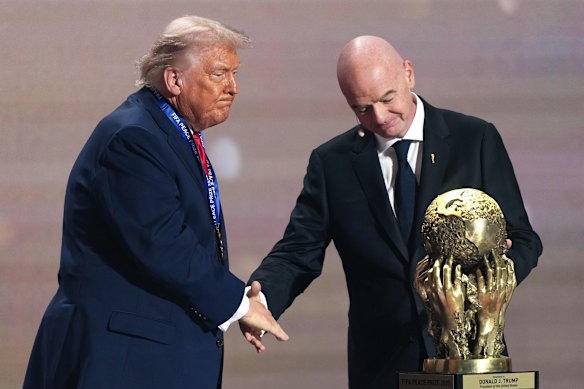 A thing but not a thing: FIFA President Gianni Infantino presents President Donald Trump with the FIFA Peace Prize late last year.