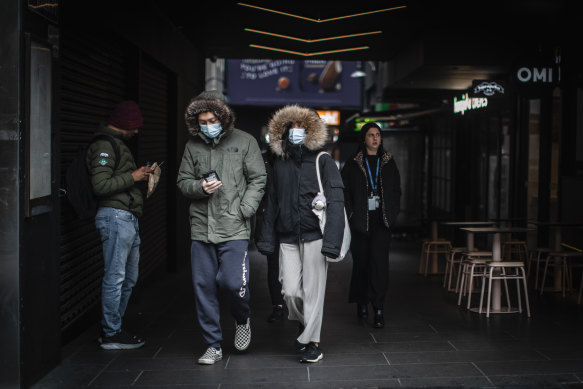 Melburnians rug up for the cold winter conditions.