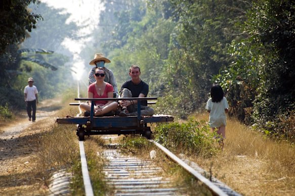 Get back to basics with Cambodia’s improvised ‘trains’, involving a wooden frame, bamboo pieces and wheels.