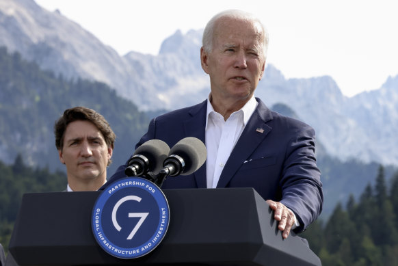 US President Joe Biden speaks at the  G7 summit in Bavaria on Sunday as  Canadian Prime Minister Justin Trudeau is looks on.