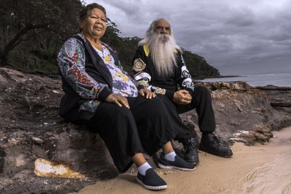 Aunty Vida Brown and Poppy Mac on the rocks at Wreck Bay.