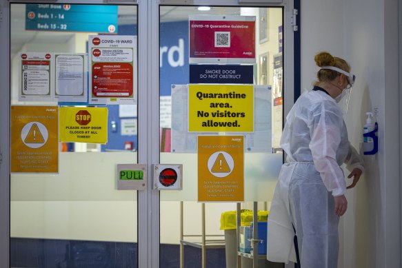 A staff member on the Austin Hospital’s COVID ward.