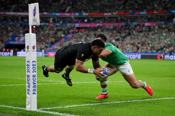 Ardie Savea dives over for a try against Ireland.