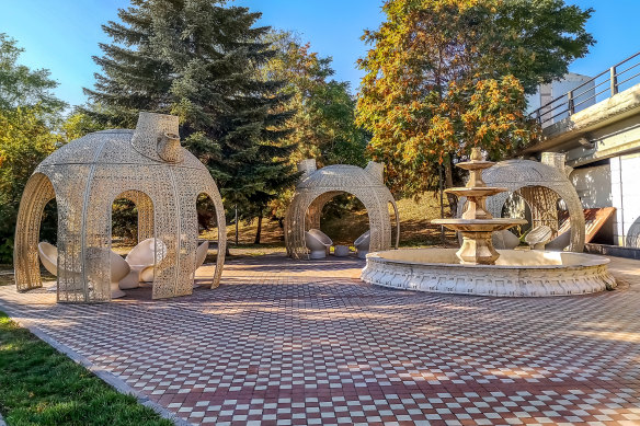 Wicker gazebos and fountain in an Ankara public square.