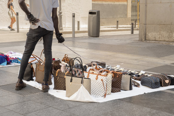 Why Is Everyone On TikTok Buying Fake Designer Handbags?