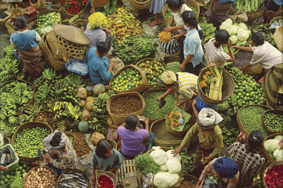 Market vendors in Ubud, Bali.