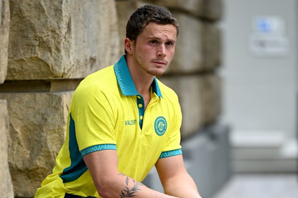 Isaac Cooper poses for a photo before the Commonwealth Games. 