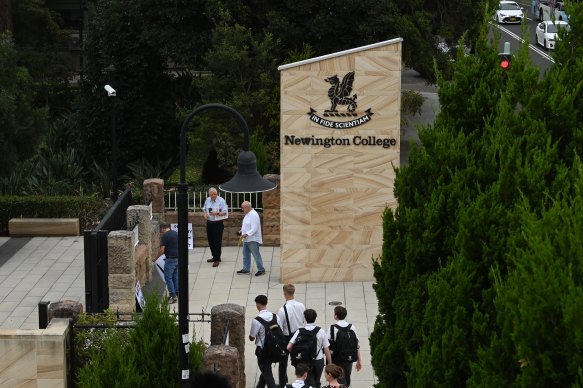 Students entering Newington College, which will soon accept female students.