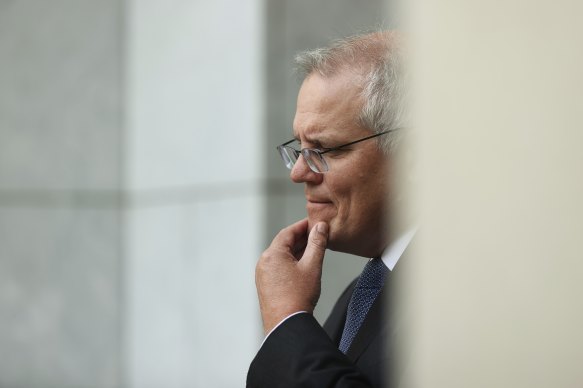 Scott Morrison, pictured in Canberra on Wednesday, said he was discussing George Christensen’s future with Nationals leader Barnaby Joyce.