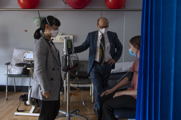 A patient is treated by Dr Stephan Faux and Dr Morgan Hee at a long COVID unit in St Vincent’s Hospital, Sydney.  