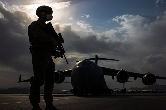 Royal Australian Air Force Airfield Defence Guards provide aircraft security at Hamid Karzai International Airport, Kabul