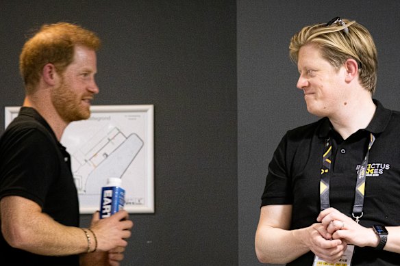 Harry with Archewell co-head James Holt at the Invictus Games in 2022.