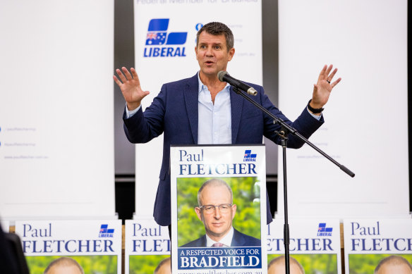 Former NSW Premier Mike Baird addresses Federal Minister Paul Fletcher’s campaign launch on Sunday.