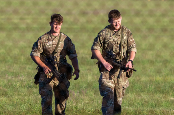 Soldiers patrol at Boscombe Down Air Base.