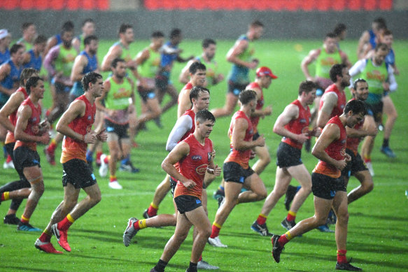 Suns players in a training session at Metricon Stadium on the Gold Coast on Wednesday.