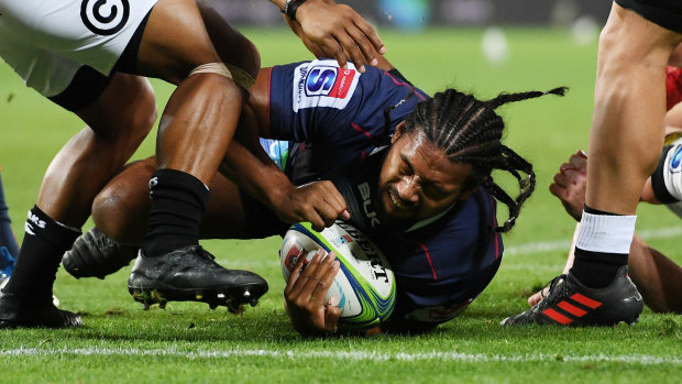 Fereti Sa'aga of the Rebels crawls across the line to score a try at the death.