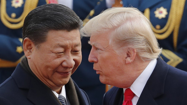 Presidents Xi and Trump in Beijing last year.