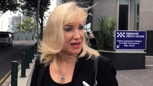 Queensland high-rise developer Susan Menso leaves the Brisbane Magistrates Court.