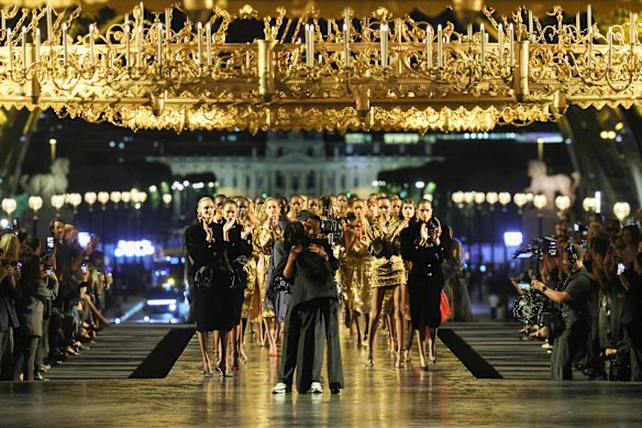 Fashion designer Anthony Vaccarello and Charlotte Gainsbourg hug on the runway during the Saint Laurent Womenswear Spring/Summer 2027 show as part of Paris Fashion Week on September 29, 2026 in Paris, France.