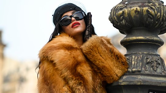 Big sunglasses, big fur, big attitude. The mob wife trend seen at Paris Fashion Week in September.