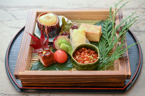 The hassun tray might include a cloud-like omelette.