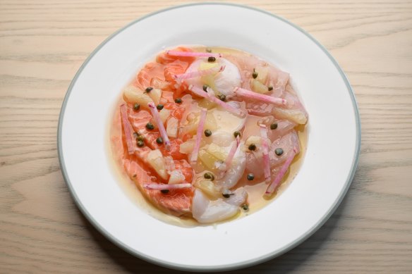 The pretty raw crudo plate with salmon, Abrolhos scallops and kingfish.